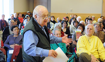 Tom Holmes, a director with the Killarney Community Centre Society, joined 140 seniors at a public forum Monday to push for a new seniors centre. PHOTO: Dan Toulgoet